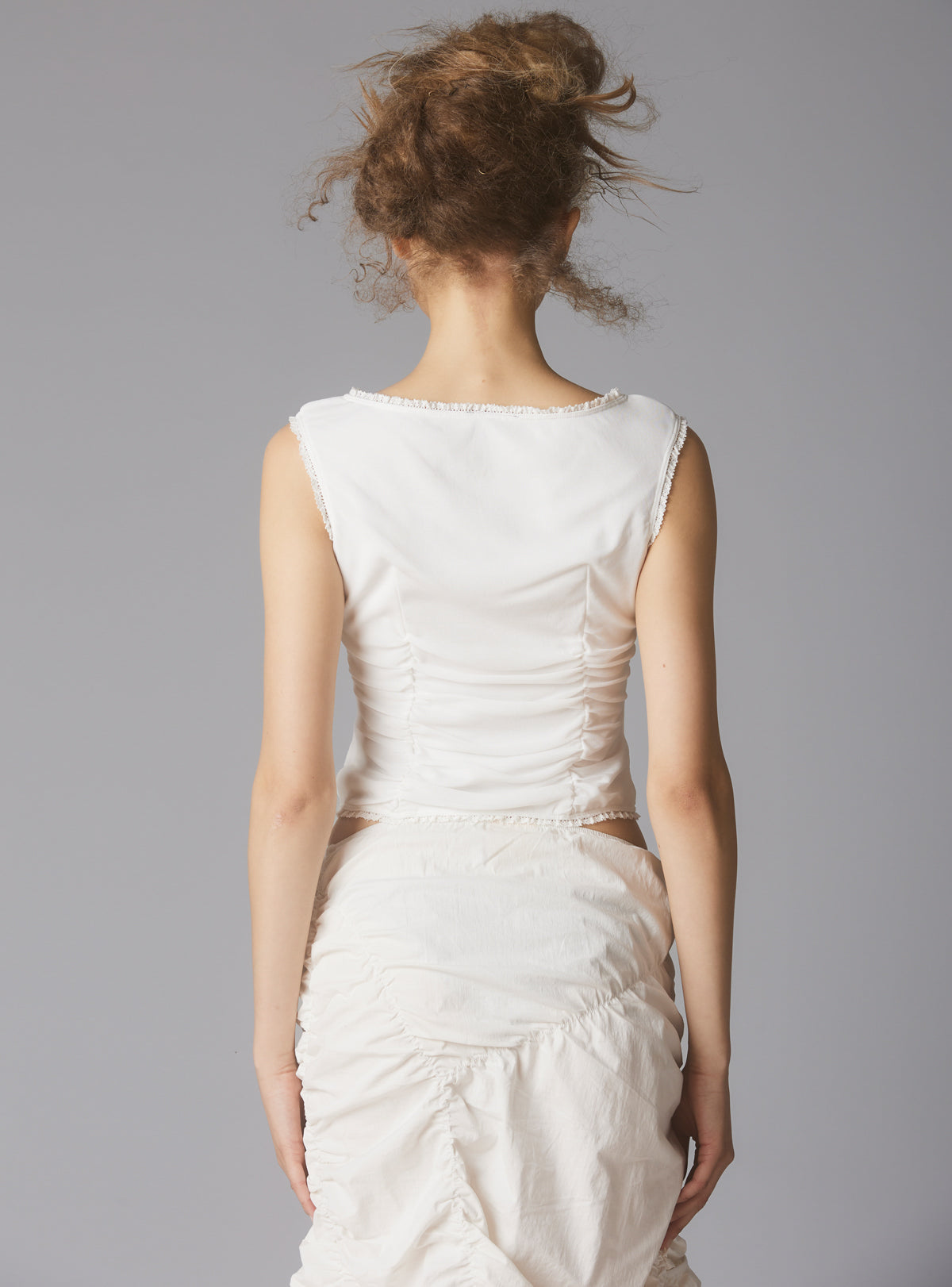 Sleeveless Top With Wide Neck & Ruffled Trim in - UNIF Clothing