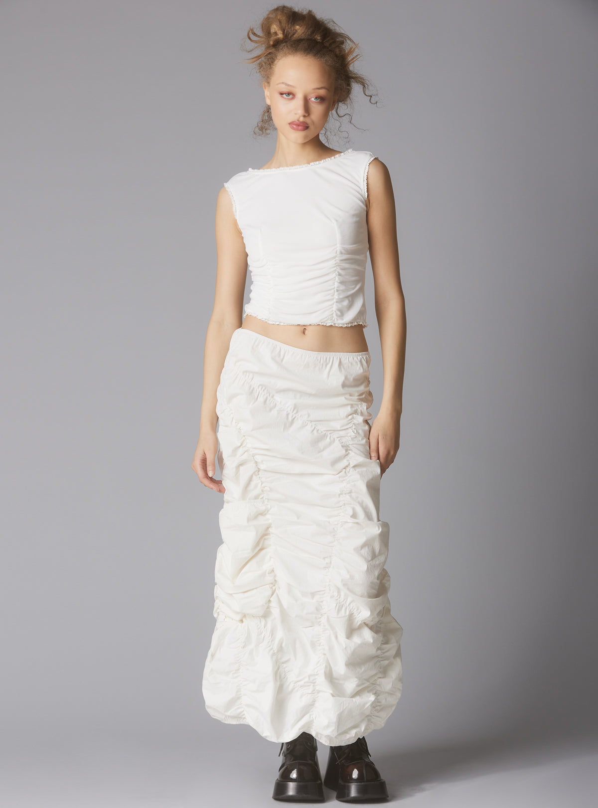 Sleeveless Top With Wide Neck & Ruffled Trim in - UNIF Clothing