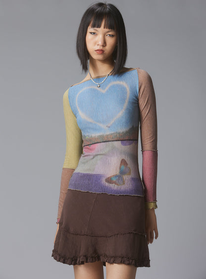 Skye Top Y2K allover-print mesh top with custom artwork - UNIF Clothing