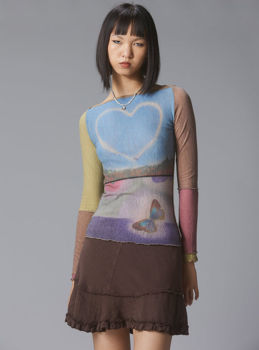 Skye Top Y2K allover-print mesh top with custom artwork - UNIF Clothing